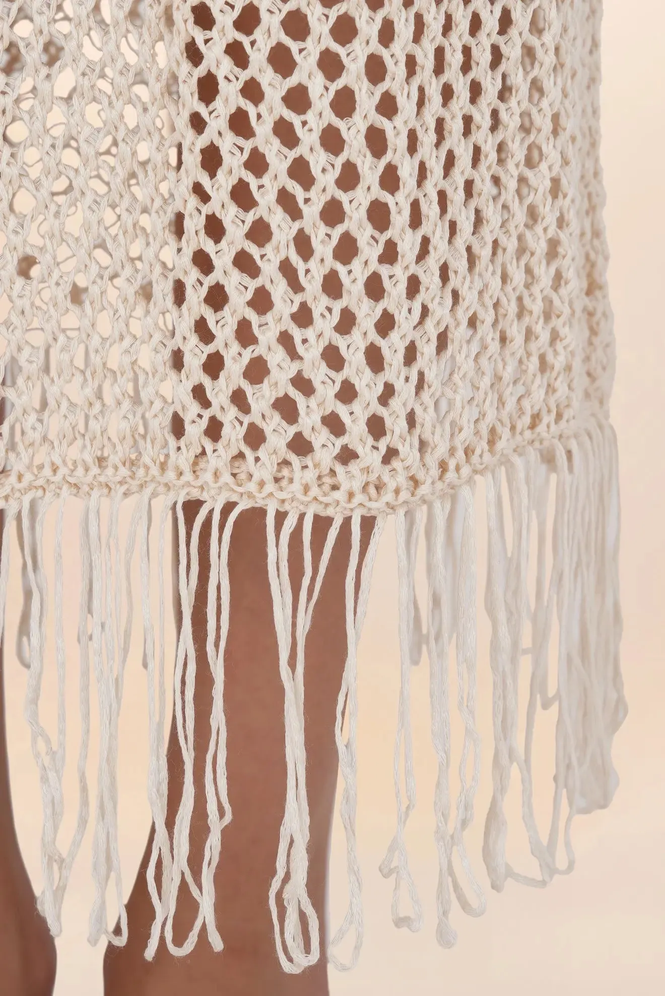 Long beige crochet dress with fringes